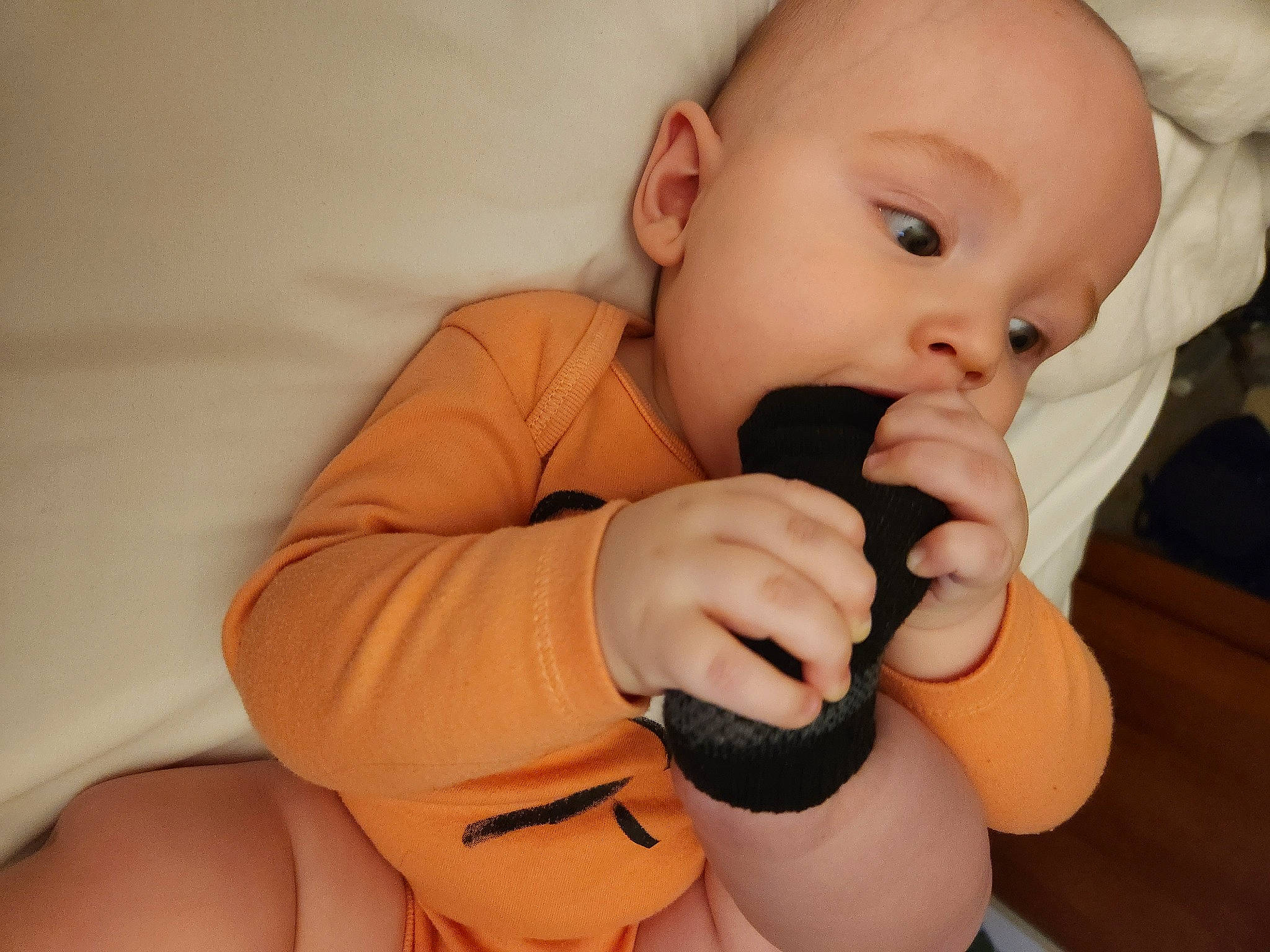 Micah joined the competition — help win amazing prizes! arm, baby, baby_toddler_clothing, cheek, comfort, eye, eyelash, finger, gesture, hand, head, human_body, mouth, nail, neck, nose, person, skin, sleeve, stomach