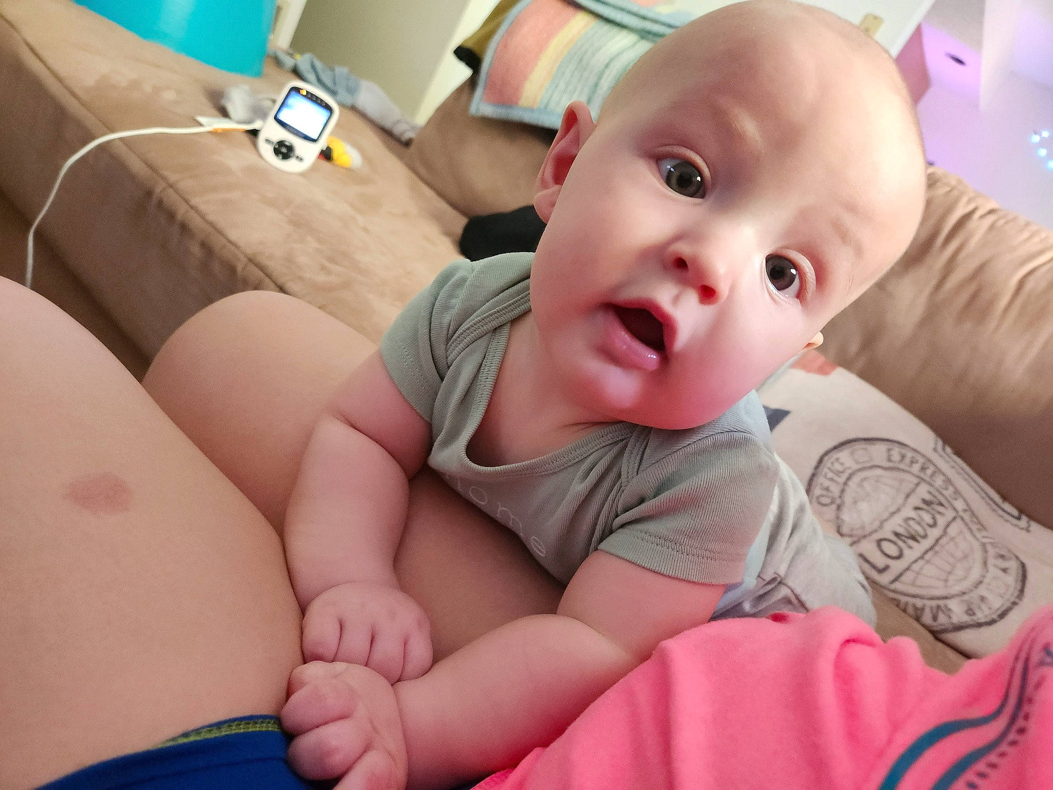 Micah joined the competition — help win amazing prizes! abdomen, baby, baby_toddler_clothing, cheek, chest, child, comfort, finger, fun, happy, human_leg, linens, mouth, person, room, sitting, skin, smile, surprise, thigh