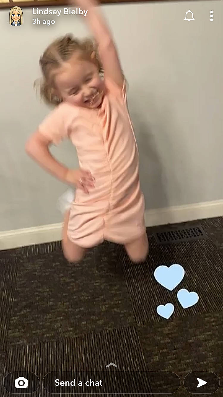 Mia joined the competition — help win amazing prizes! baby, baby_toddler_clothing, barefoot, dress, elbow, finger, floor, flooring, foot, hardwood, human_body, human_leg, joy, knee, leg, person, sleeve, smile, thigh, thumb