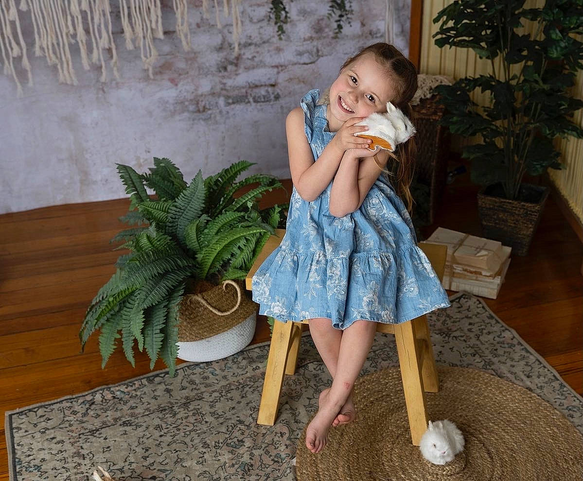 Mia joined the competition — help win amazing prizes! arecales, baby_toddler_clothing, child, floor, flooring, foot, fun, grass, hardwood, human_leg, joint, joy, leaf, leisure, person, plant, room, sitting, textile, toddler
