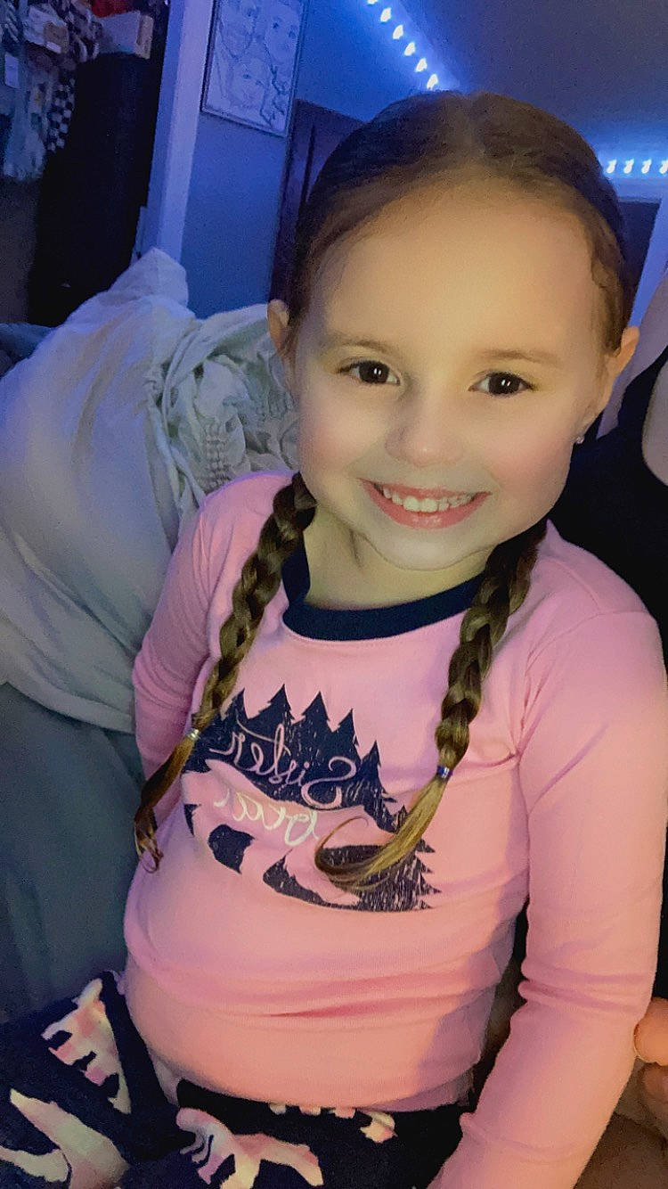 Mia is registered to the contest to win money with this photo: black_hair, cheek, chin, cool, eyebrow, eyelash, flash_photography, forehead, happy, iris, joy, long_hair, mouth, neck, person, pink, purple, shoulder, skin, sleeve