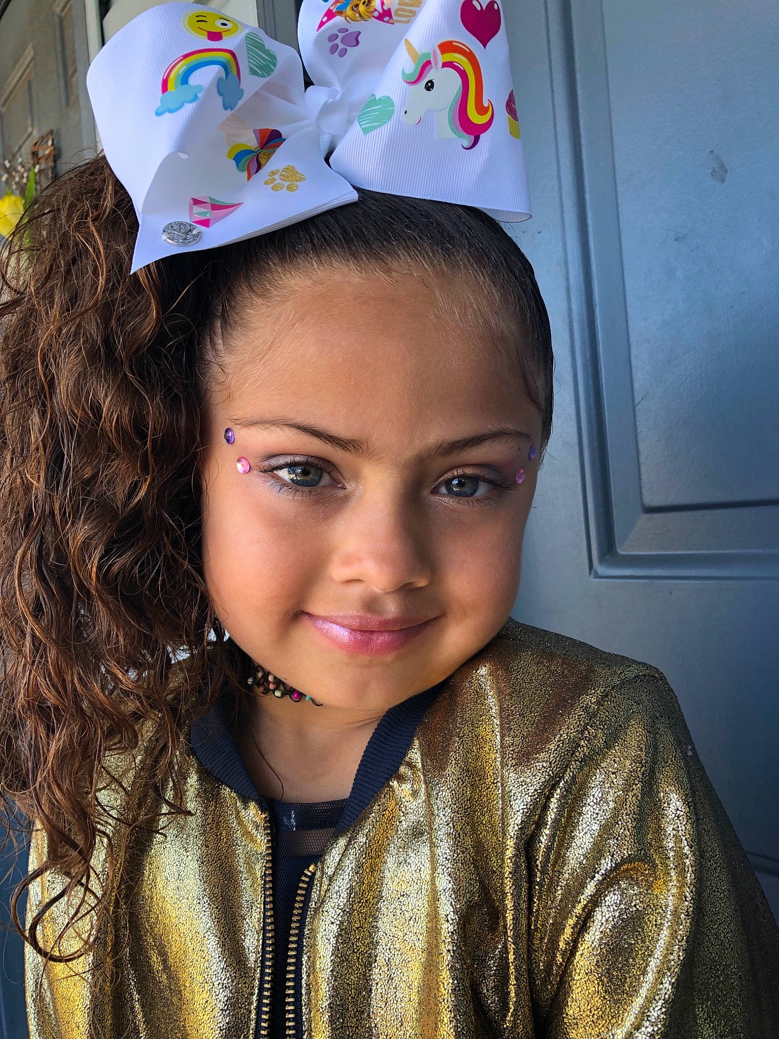 Kaitlyn is registered to the contest to win money with this photo: child, fashion_accessory, forehead, hair, hair_accessory, head, headgear, headpiece, joy, person, smile, toddler