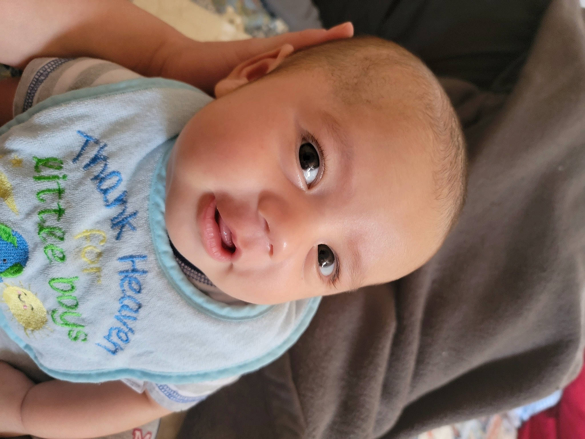 Galu is registered to the contest to win money with this photo: baby, baby_toddler_clothing, cheek, child, chin, close_up, comfort, eyebrow, eyelash, facial_expression, grass, happy, iris, lip, mouth, nose, person, skin, sleeve, smile