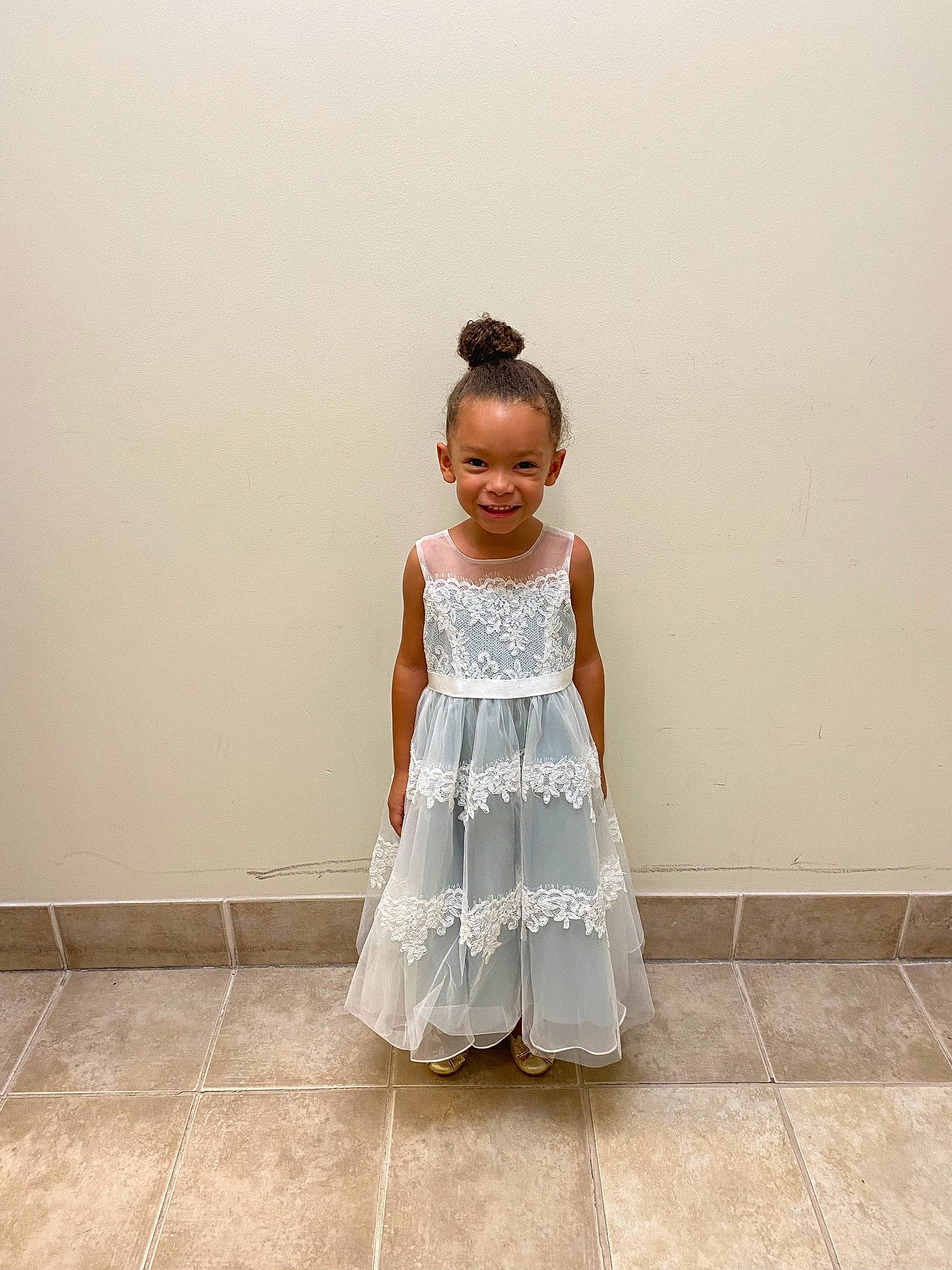 Rylan is registered to the contest to win money with this photo: baby_toddler_clothing, bridal_accessory, bridal_clothing, child, day_dress, dress, fashion_design, flash_photography, floor, flooring, gesture, hair, happy, joy, neck, one_piece_garment, person, skin, sleeve, smile