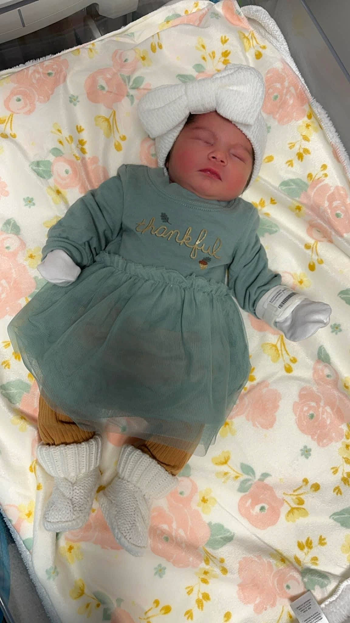 Analysia is registered to the contest to win money with this photo: baby, baby_products, baby_safety, baby_sleeping, baby_toddler_clothing, bedding, child, comfort, face, headwear, linens, pattern, person, pink, room, sitting, skin, sleeve, sock, textile