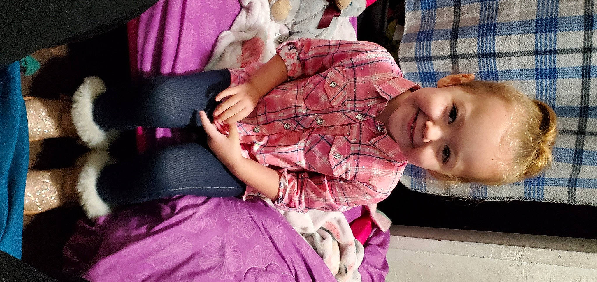 Catherine is registered to the contest to win money with this photo: baby, baby_products, baby_toddler_clothing, child, comfort, fun, happy, joy, lap, magenta, mammal, pattern, person, pink, plaid, purple, sitting, skin, smile, tartan