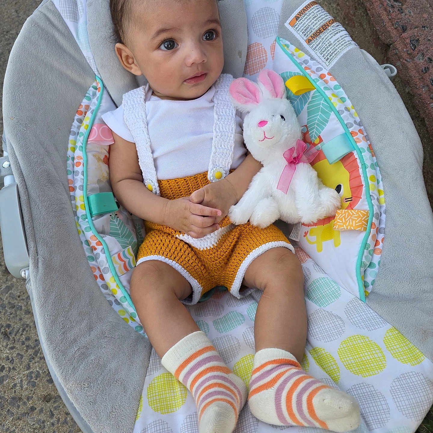 Analaxia joined the competition — help win amazing prizes! adorable, baby, baby_rocker, bunny, casual, child, colorful, cute, footwear, infant, knitted_clothing, looking_away, outdoor, playful, plush_toy, portrait, seat, soft_toy, striped_socks, young_child