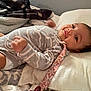 Analaxia joined the competition — help win amazing prizes! baby, smile, bed, blanket, onesie, diaper, pacifier_clip, infant, lying_down, happy, cozy, patterned_clothing, cute, child, face, pillow, resting, indoors, person, young_child