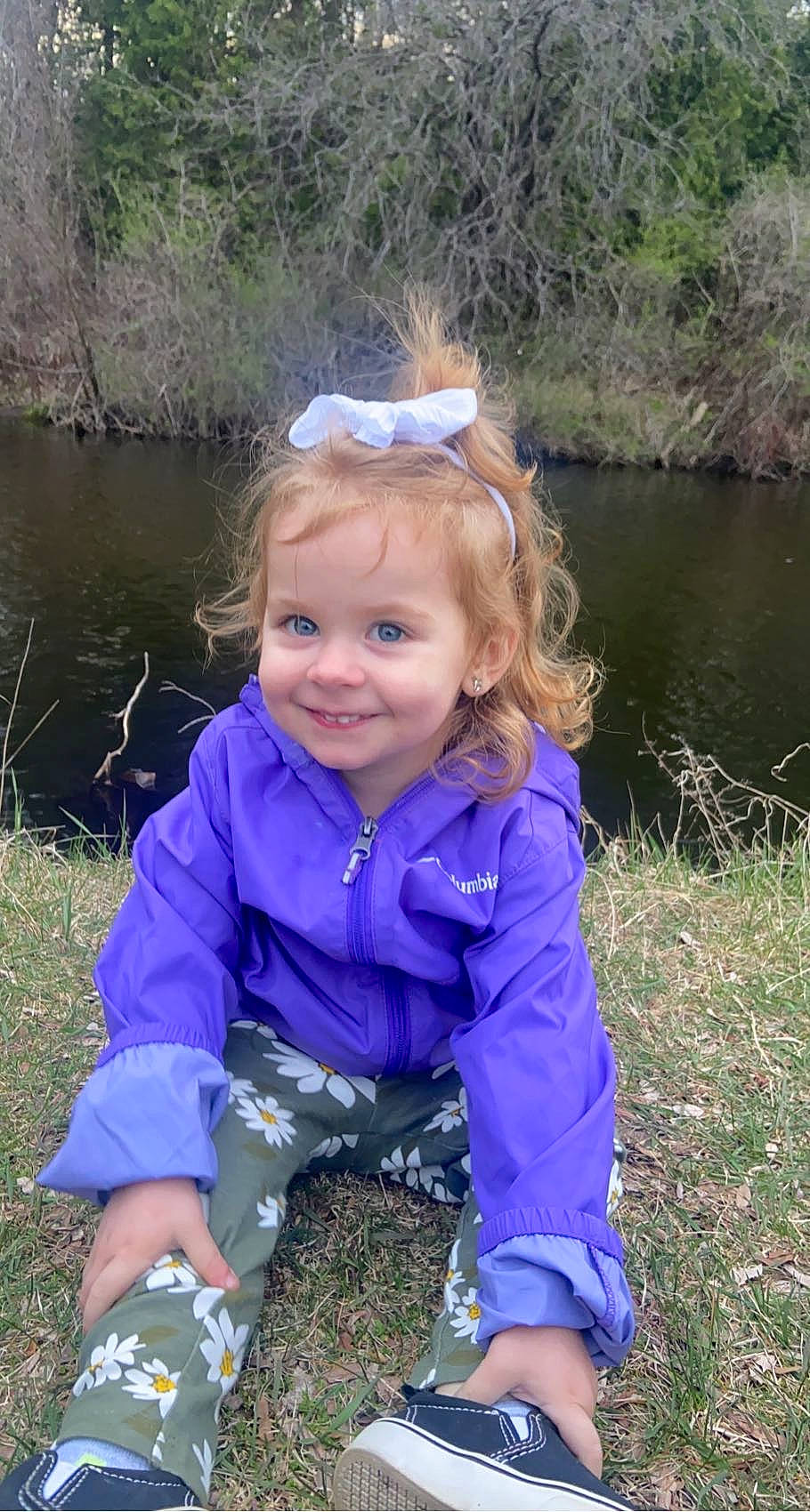 Peyton joined the competition — help win amazing prizes! baby_toddler_clothing, child, electric_blue, eye, face, fun, grass, grassland, happy, joy, lake, people_in_nature, person, personal_protective_equipment, plant, recreation, smile, spring, toddler, tree