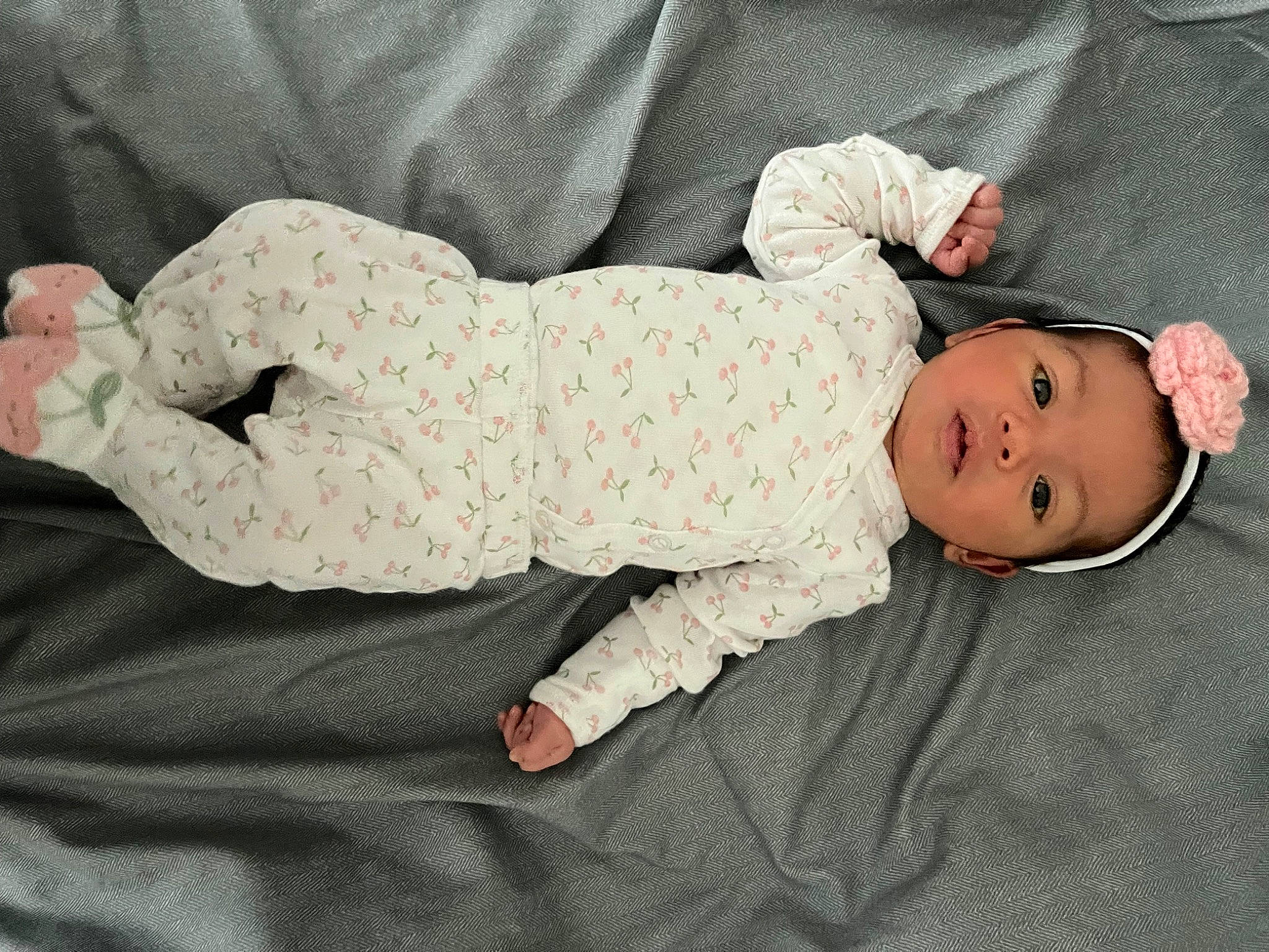 Kaylani joined the competition — help win amazing prizes! arm, baby, baby_products, baby_sleeping, baby_toddler_clothing, child, collar, comfort, face, foot, hand, head, headgear, human_body, linens, pattern, person, skin, sleeve, sock