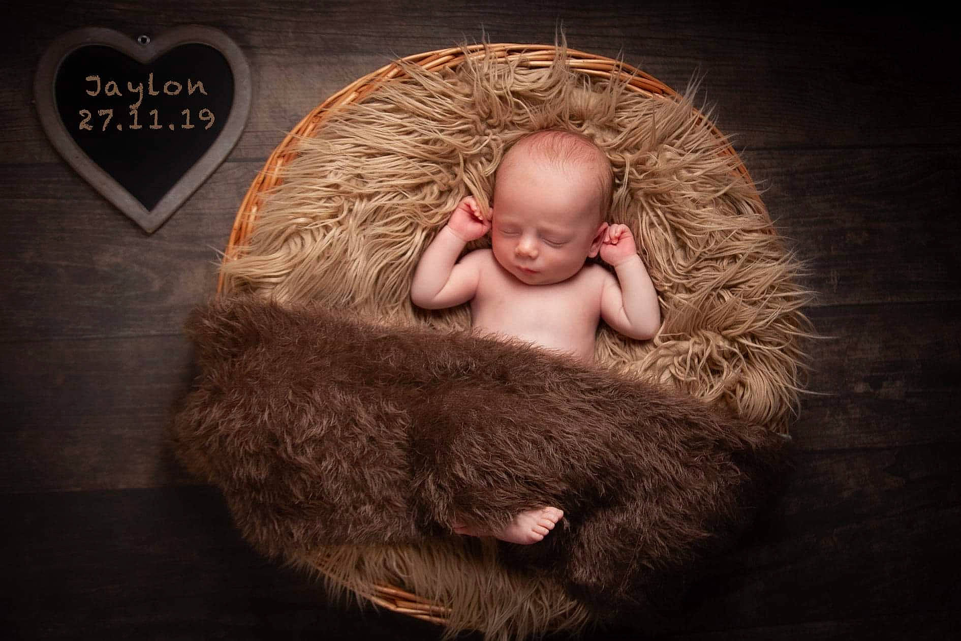 Jaylon is registered to the contest to win money with this photo: baby, child, ear, fur, fur_clothing, person, photograph, photography, sleep, toddler