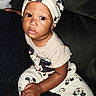 Chozen joined the competition — help win amazing prizes! baby, child, portrait, sitting, indoors, couch, mickey_mouse, outfit, hat, headwear, wide_eyes, facial_expression, dark_background, close_up, person, infant, clothing, photograph, home, cute