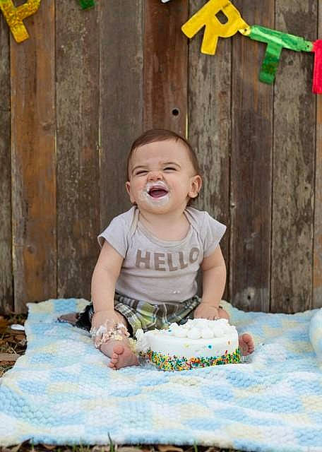 Kyle joined the competition — help win amazing prizes! baby_toddler_clothing, birthday, cake, cake_decorating, child, dress, event, face, food, fun, grass, green, happy, person, smile, sugar_cake, summer, sweetness, toddler, wood