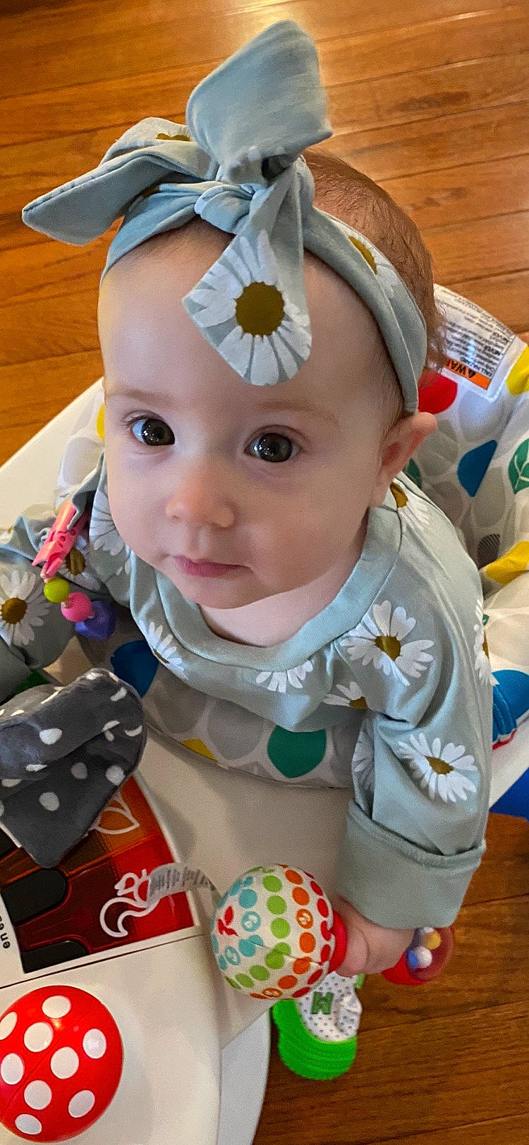 Ivy joined the competition — help win amazing prizes! baby, baby_products, baby_toddler_clothing, bib, blue, cheek, child, chin, face, fun, head, headband, iris, person, product, sitting, skin, sleeve, toddler, white