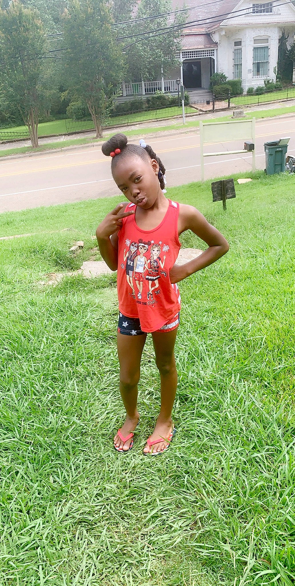 Corniyah is registered to the contest to win money with this photo: child, fun, garden, grass, grass_family, grassland, groundcover, happy, human_settlement, lawn, leaf, leisure, meadow, people_in_nature, person, plant, recreation, summer, t_shirt, toddler