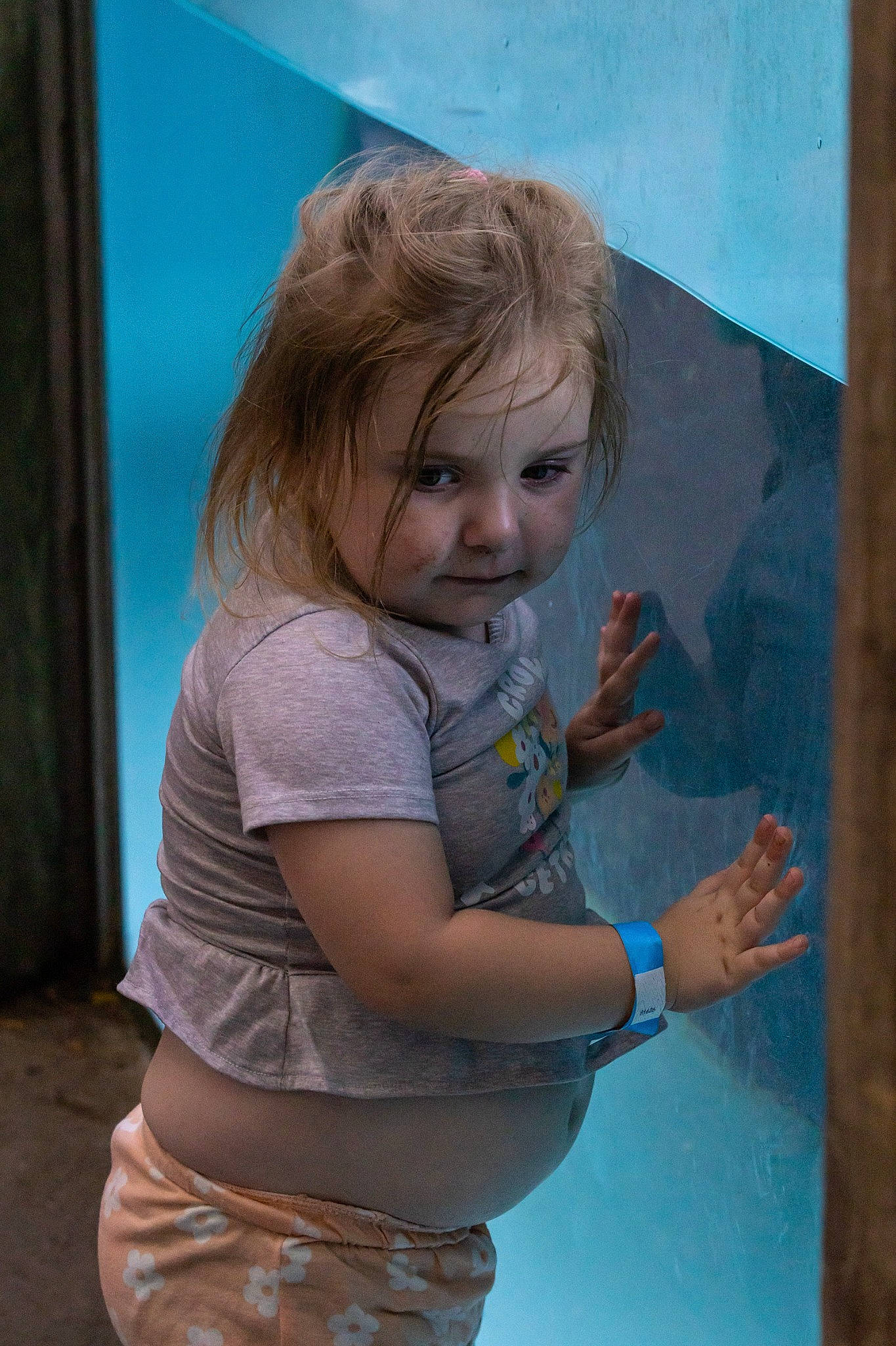 Jaelynn is registered to the contest to win money with this photo: art, blond, cheek, child, electric_blue, facial_expression, fun, gesture, glass, hairstyle, happy, human, human_body, leisure, person, recreation, toddler, visual_arts, water, wood