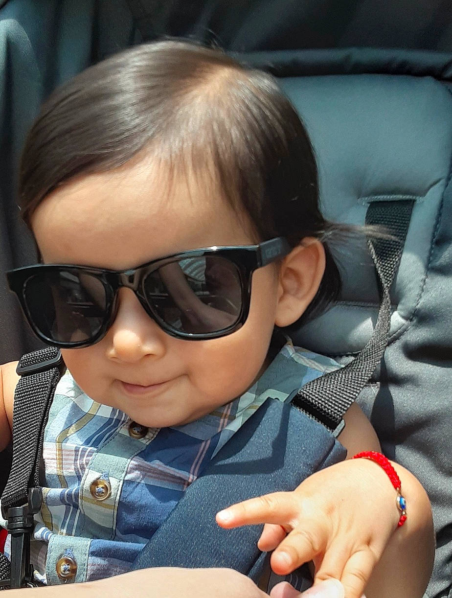 Thiago joined the competition — help win amazing prizes! auto_part, car_seat, cheek, comfort, cool, eyebrow, eyewear, facial_expression, glasses, goggles, iris, lip, mouth, nose, person, personal_protective_equipment, seat_belt, skin, sunglasses, toddler