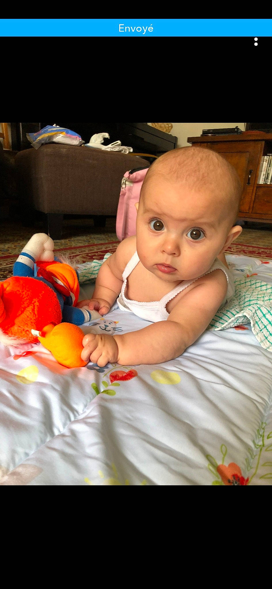 Ohanna participe au concours pour gagner de l'argent avec cette photo : baby, cheek, child, person, play, toddler, tummy_time