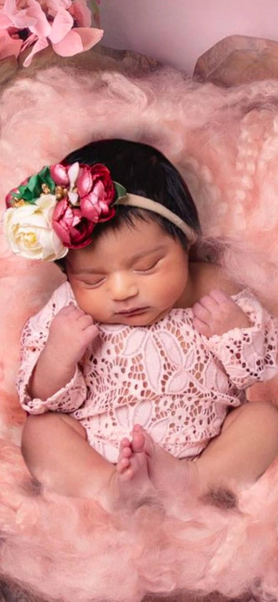 Amirah joined the competition — help win amazing prizes! baby, baby_toddler_clothing, cheek, chin, dress, eye, face, facial_expression, flower, hairstyle, hand, head, headgear, lip, person, petal, pink, plant, product, skin