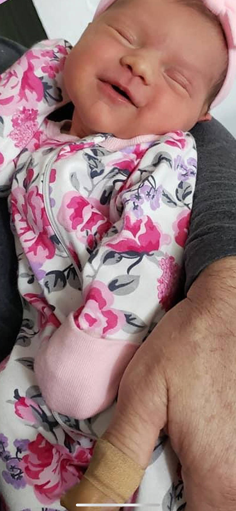 Brittany is registered to the contest to win money with this photo: black_hair, cheek, eyelash, finger, gesture, hand, happy, human_body, joint, mouth, muscle, neck, organ, person, pink, skin, sleeve, smile, thigh, thumb