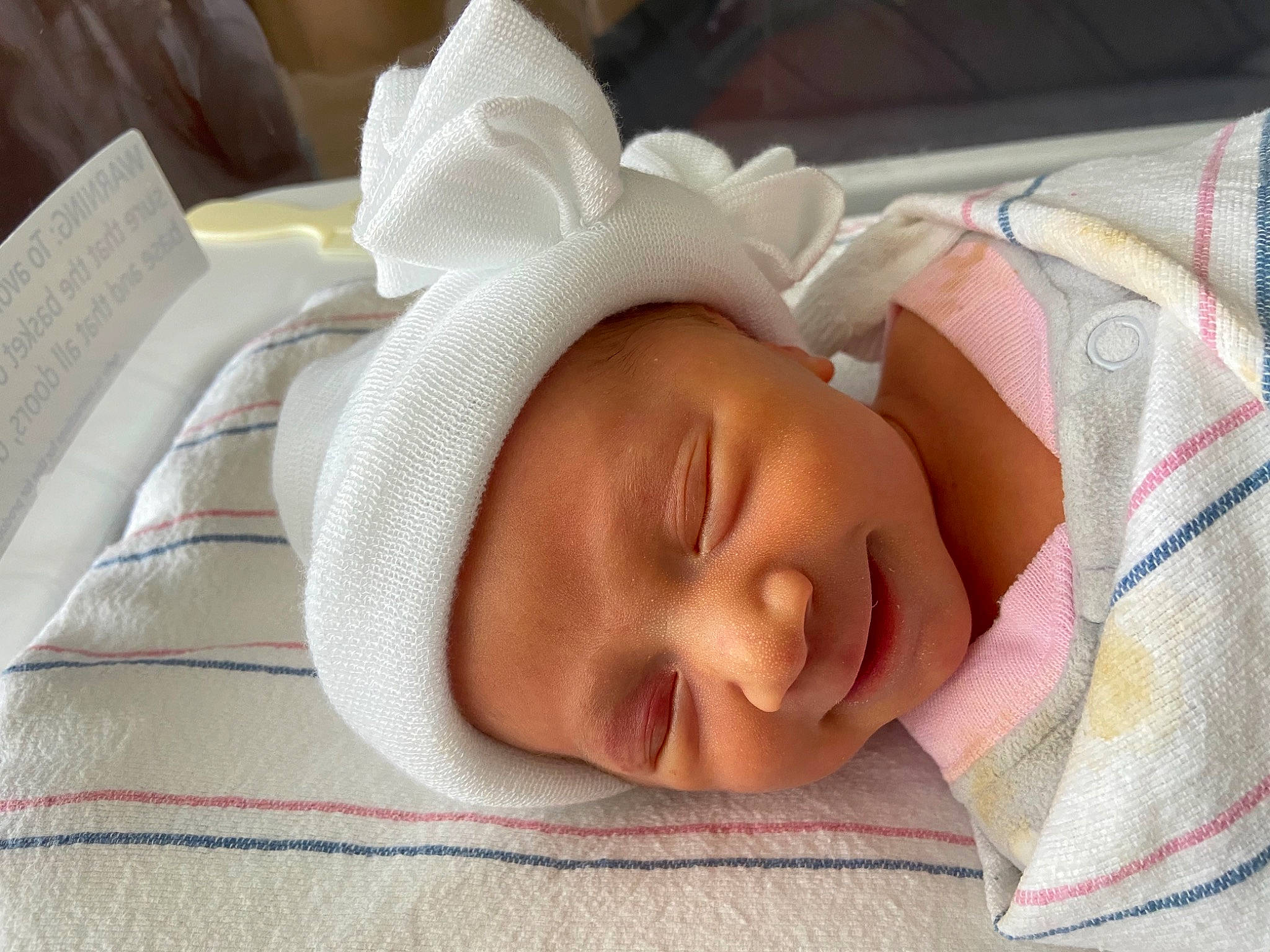 Kaylee joined the competition — help win amazing prizes! baby, baby_products, baby_sleeping, baby_toddler_clothing, bedtime, cheek, child, comfort, eyebrow, eyelash, hat, headgear, headwear, linens, lip, nap, nose, peach, person, room