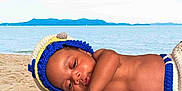 Tiesean joined the competition — help win amazing prizes! baby, infant, beach, sand, ocean, blanket, crocheted_hat, crocheted_diaper_cover, lighthouse, anchor, hand, lying_down, outdoors, sky, water, relaxing, cute, child, nautical, summer