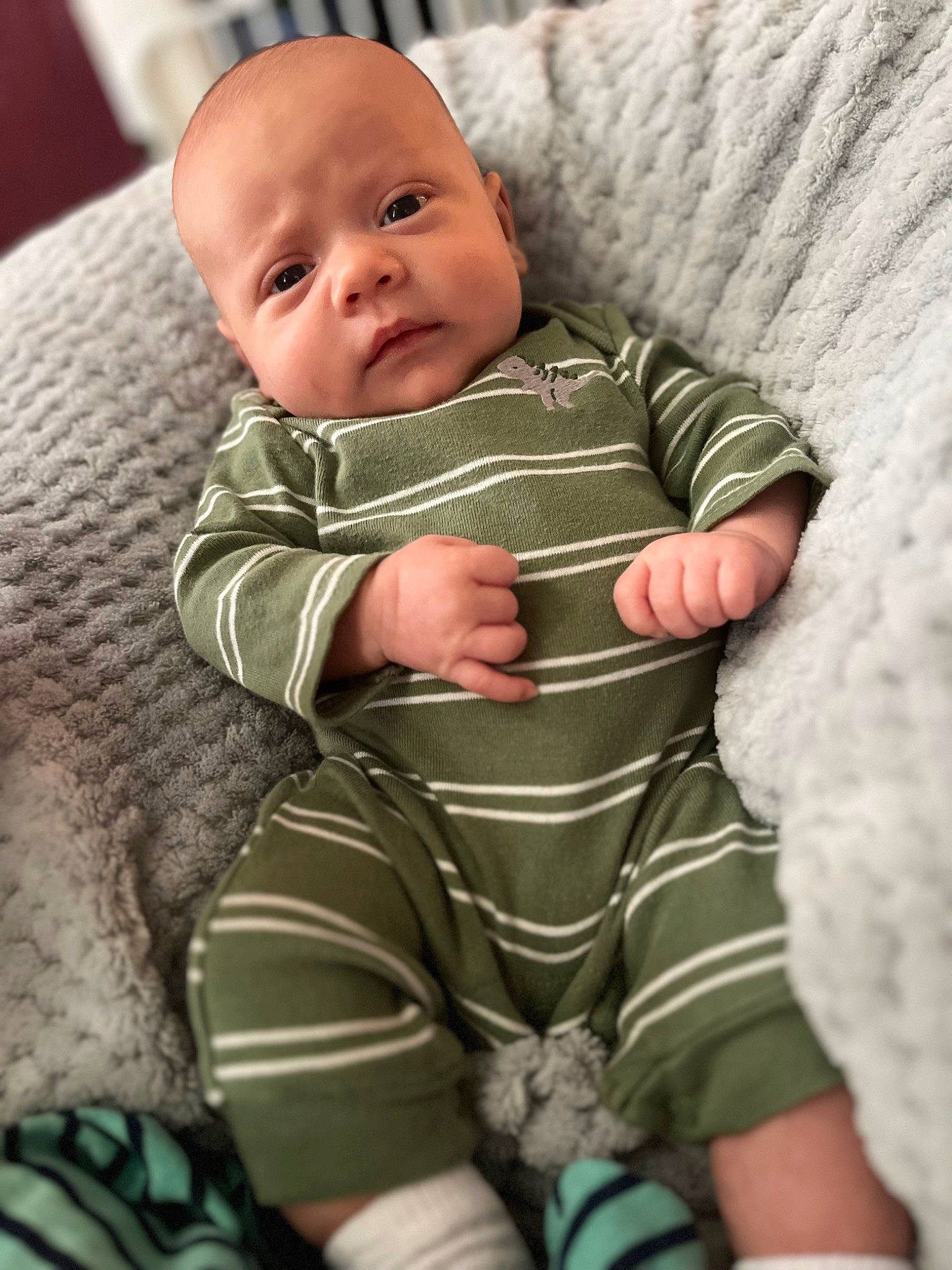 Kolt is registered to the contest to win money with this photo: baby, baby_sleeping, baby_toddler_clothing, bedtime, cheek, child, chin, comfort, elbow, eye, face, fur, head, linens, person, portrait_photography, room, sitting, sleep, sleeve