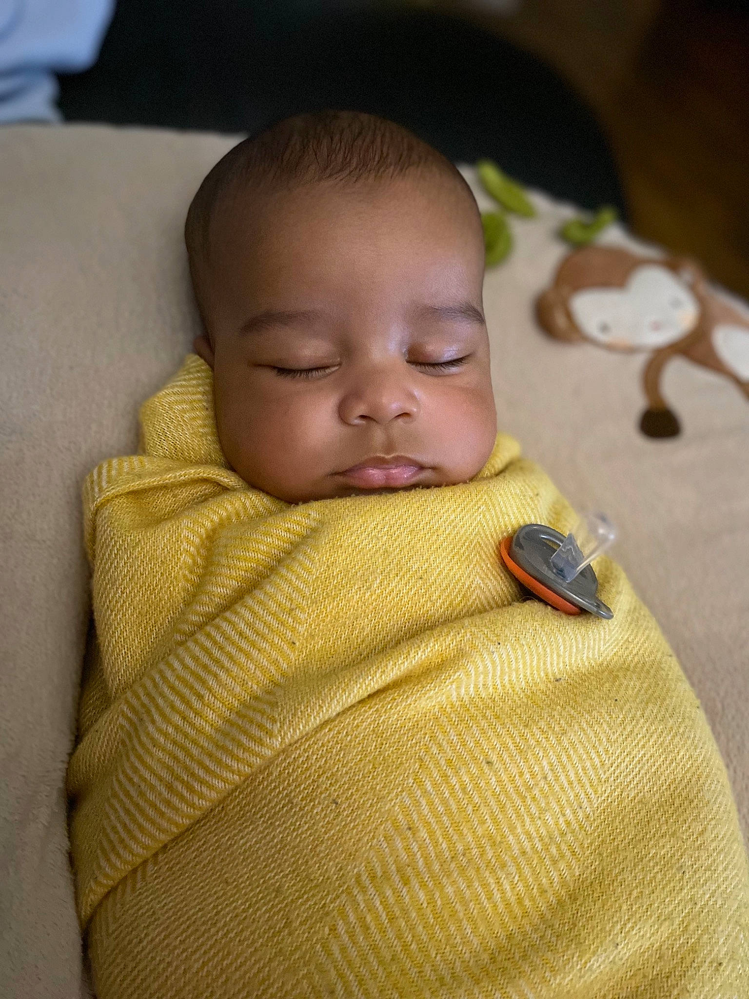 Dequan Jr is registered to the contest to win money with this photo: abdomen, baby, baby_toddler_clothing, cheek, child, comfort, grass, iris, knitting, linens, lip, neck, nose, person, room, sitting, skin, sleeve, toddler, wood