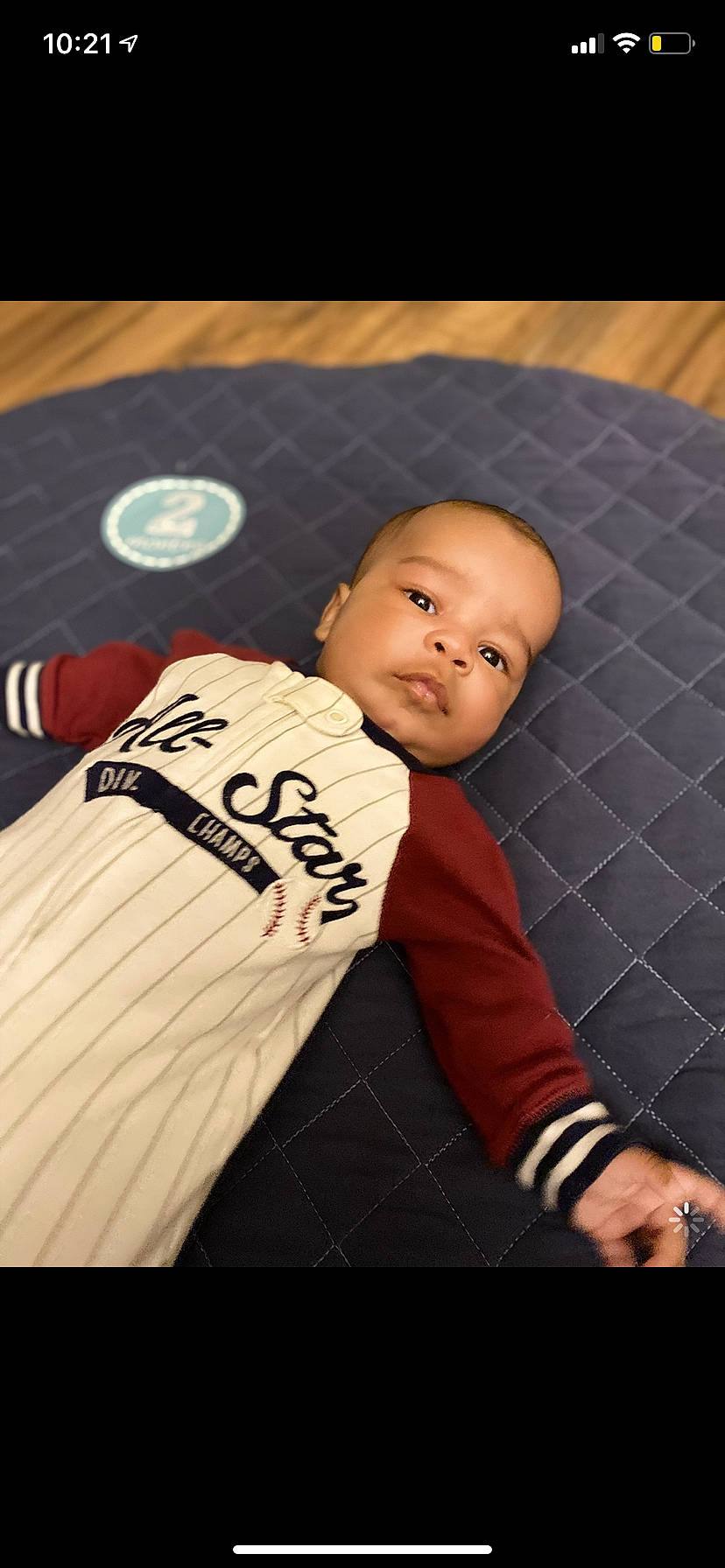 Dequan Jr joined the competition — help win amazing prizes! baby, baby_toddler_clothing, ball, child, finger, flash_photography, flooring, font, football, fun, happy, hat, pattern, person, personal_protective_equipment, product, sitting, sleeve, sportswear, t_shirt