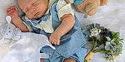 Maxim joined the competition — help win amazing prizes! baby, sleeping, plush_toy, bunny, blue_outfit, white_socks, flower_bouquet, soft_blanket, infant, peaceful, cute, child, resting, indoors, adorable, newborn, soft_toys, cozy, portrait, sleep