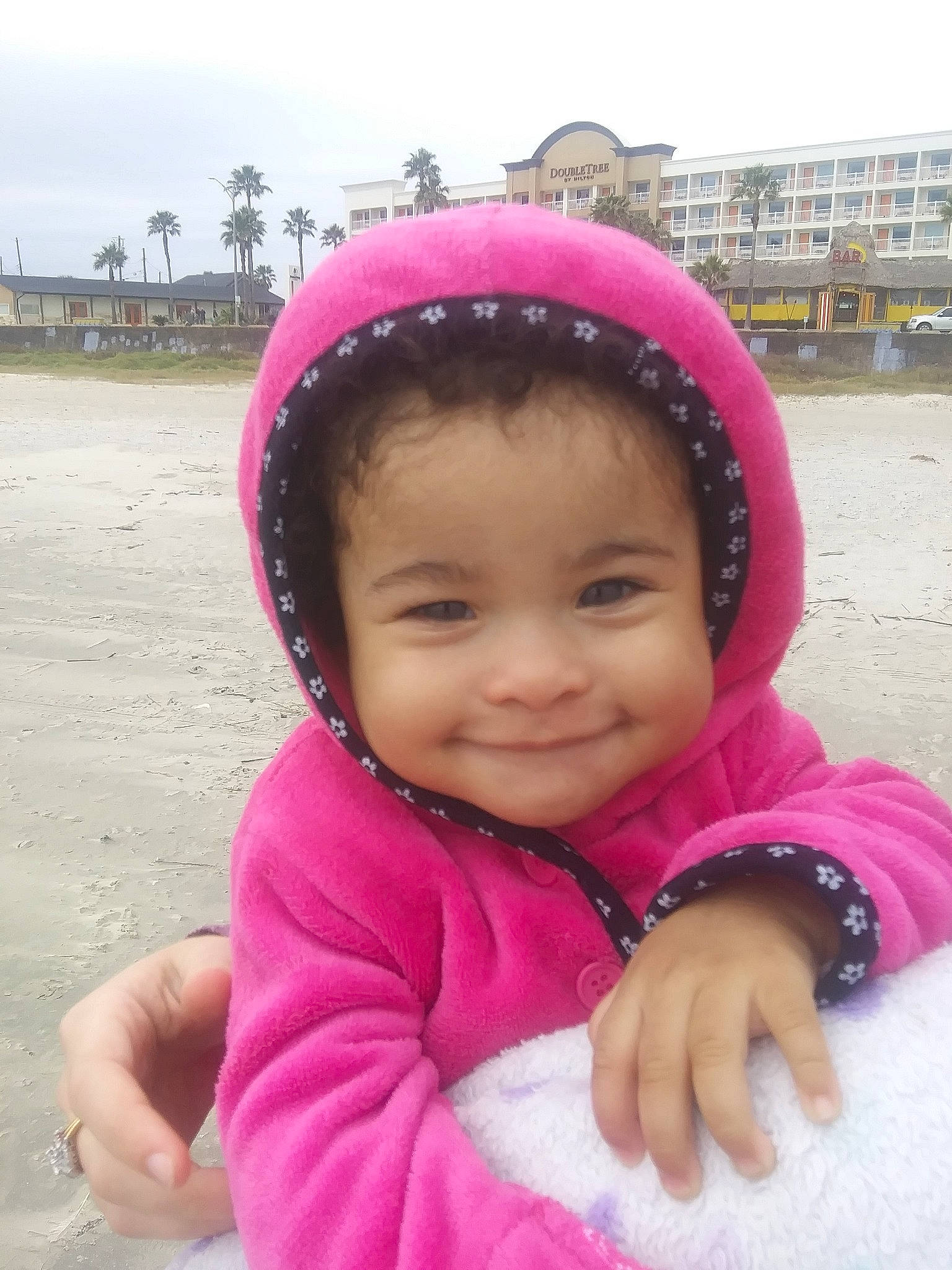 Kyanna is registered to the contest to win money with this photo: cheek, child, day, fun, girl, happiness, head, headgear, infant, joy, magenta, person, pink, play, product, purple, skin, smile, toddler, vacation