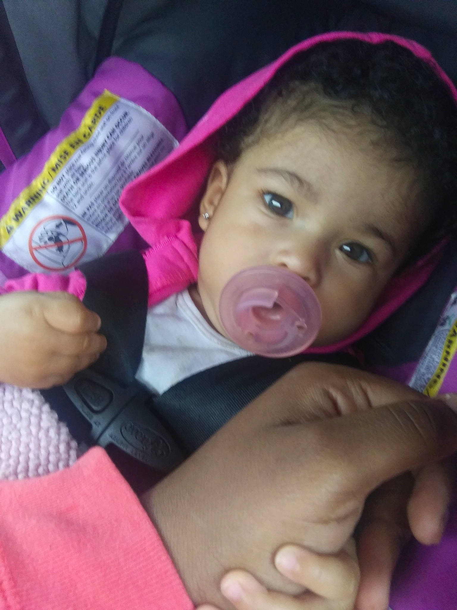 Kyanna is registered to the contest to win money with this photo: black_hair, cheek, child, chin, day, ear, face, finger, forehead, hand, head, infant, lip, mouth, nose, person, pink, product, purple, skin