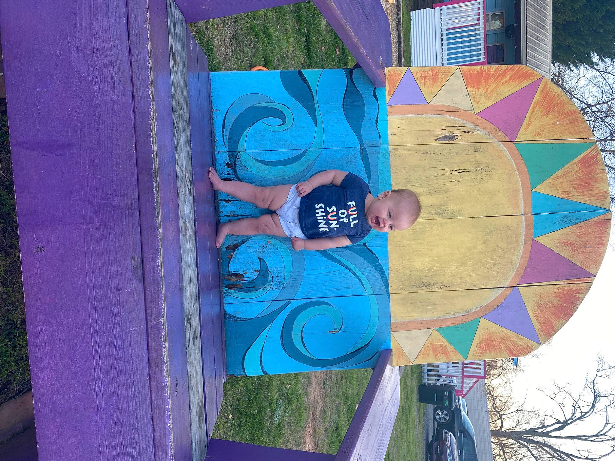 Ila is registered to the contest to win money with this photo: art, automotive_wheel_system, azure, blue, circle, electric_blue, facade, fun, hat, leisure, paint, pattern, person, plant, t_shirt, textile, tree, visual_arts, wheel, wood