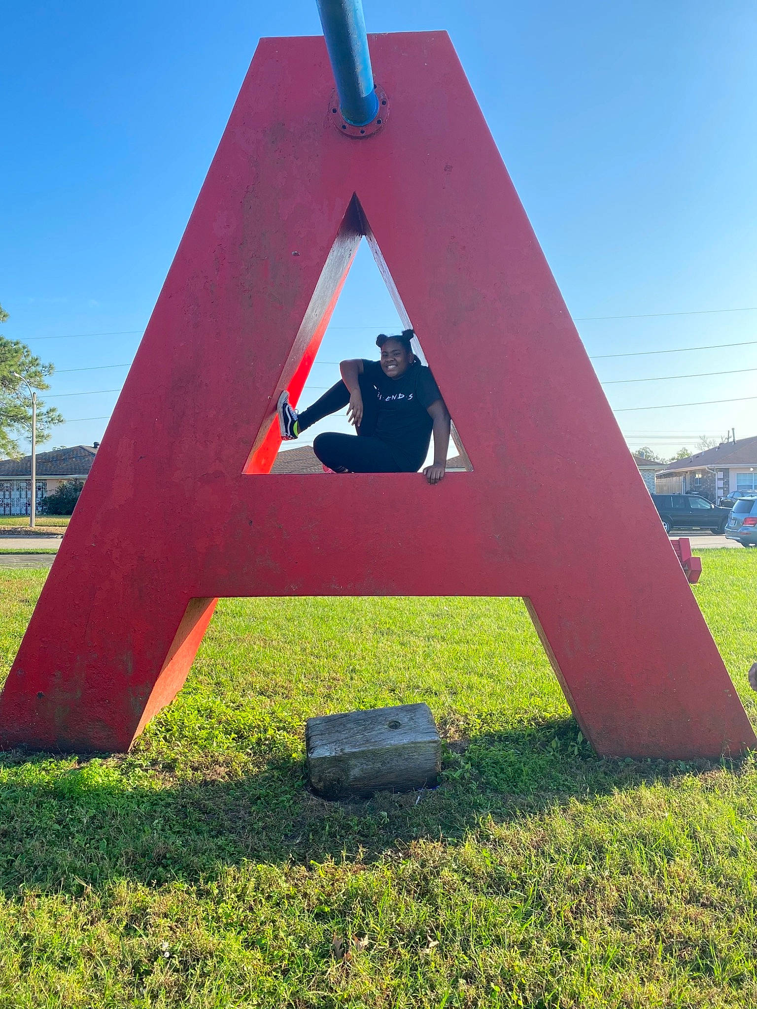 Zairi King joined the competition — help win amazing prizes! architecture, art, games, grass, joy, monument, person, sculpture, sky, triangle
