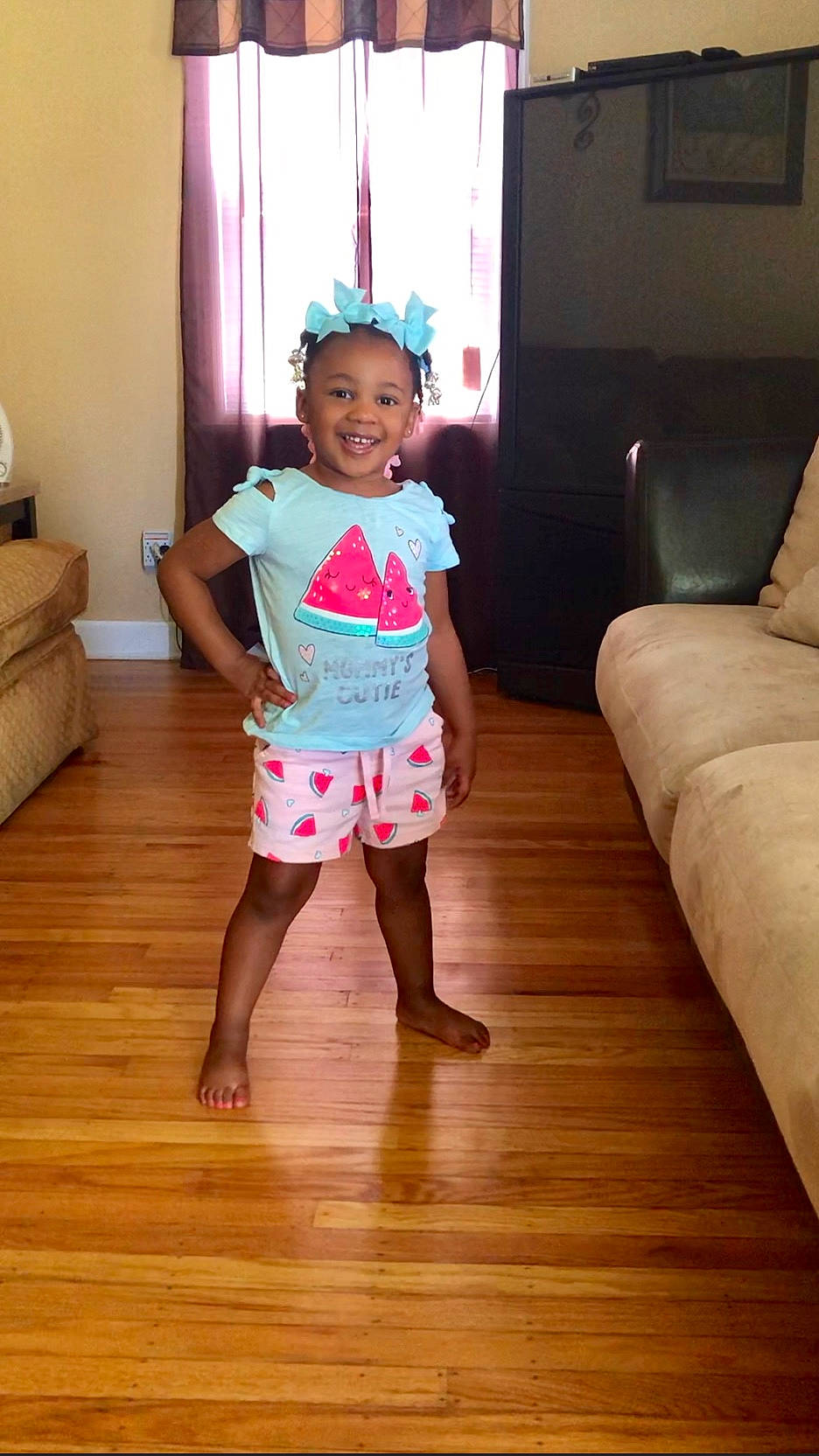 Kenadi is registered to the contest to win money with this photo: child, dress, floor, flooring, fun, hardwood, joint, joy, knee, leg, person, pink, room, shoe, shoulder, standing, toddler, wood, wood_flooring