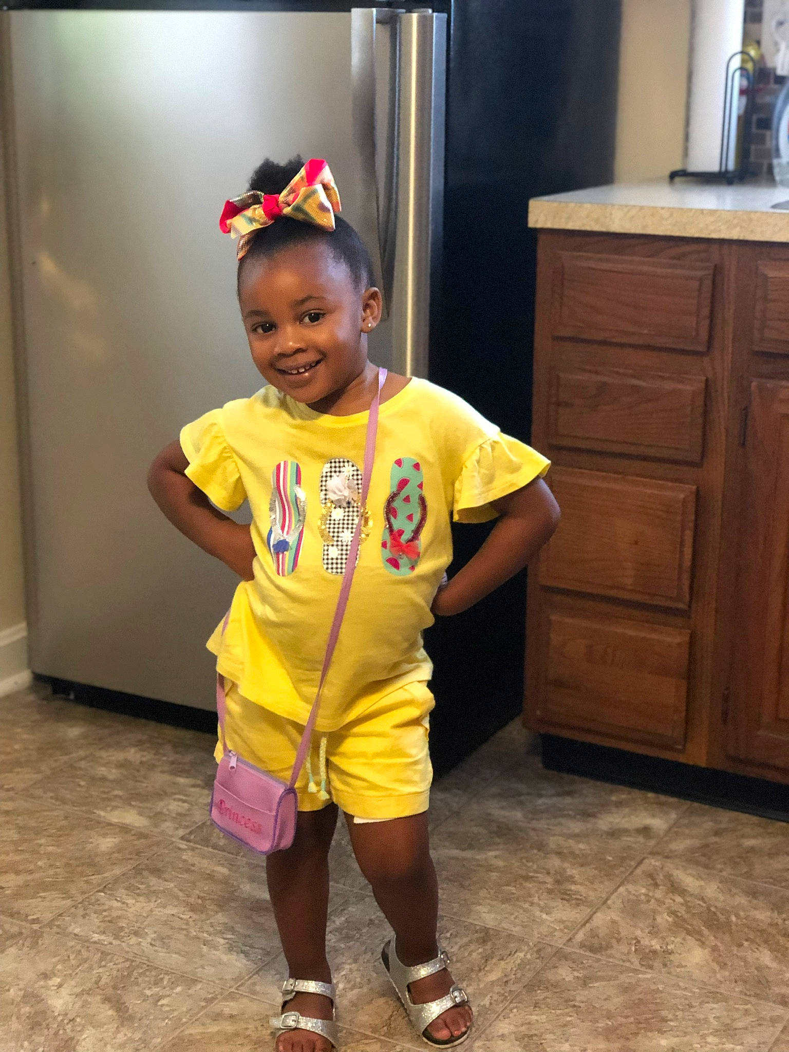 Kenadi is registered to the contest to win money with this photo: child, costume, happy, joy, person, smile, toddler, yellow