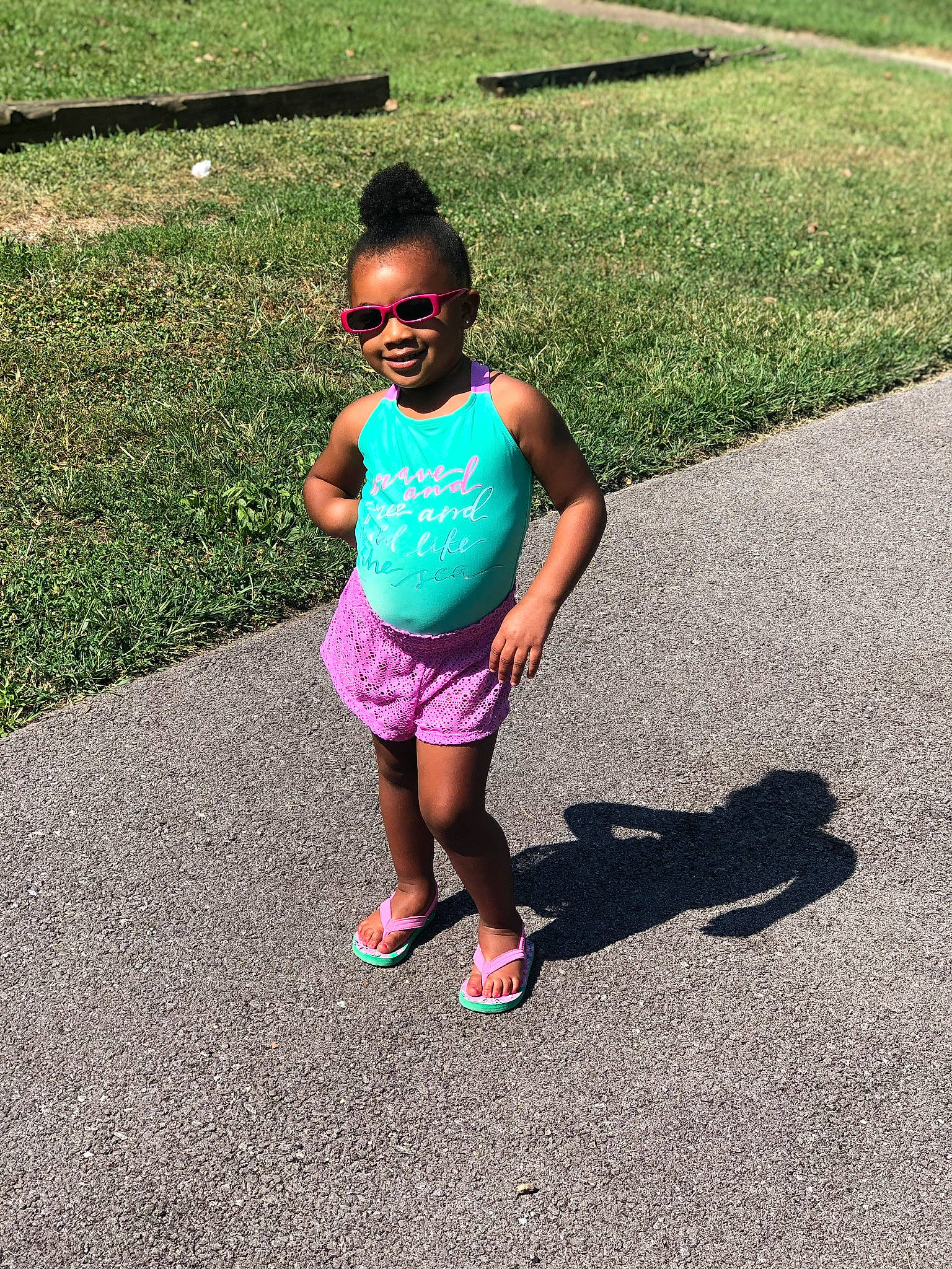 Kenadi joined the competition — help win amazing prizes! asphalt, child, footwear, fun, grass, joint, joy, leg, leisure, people, person, pink, plant, play, recreation, shadow, shoe, smile, summer, toddler