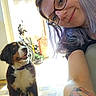 Meïko a rejoint le concours — aidez-le/la à gagner de superbes lots ! woman, dog, puppy, indoor, selfie, tattoo, glasses, purple_hair, smile, floor, tile_floor, doorway, sunlight, curious, pet, casual, home, portrait, young_adult, animal