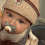 baby, baby_fashion, child, close_up, coat, cozy, cute, expression, eyes, face, hat, indoor, infant, knitted_hat, pacifier, portrait, scarf, soft_texture, warm, winter_clothing