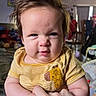 Maximilian joined the competition — help win amazing prizes! adult_hand, baby, brown_hair, candid, child, close_up, cozy, face, furniture, home, indoor, infant, photography, portrait, seated, smiling, striped_shirt, toys, wide_eyed, yellow_clothing