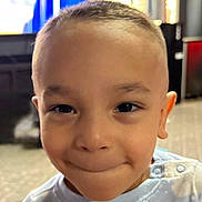 Dominic joined the competition — help win amazing prizes! child, face, portrait, smile, young, boy, closeup, expression, casual_clothing, indoors, buttoned_shirt, short_hair, cute, happy, playful, person, skin, head, eyes, light