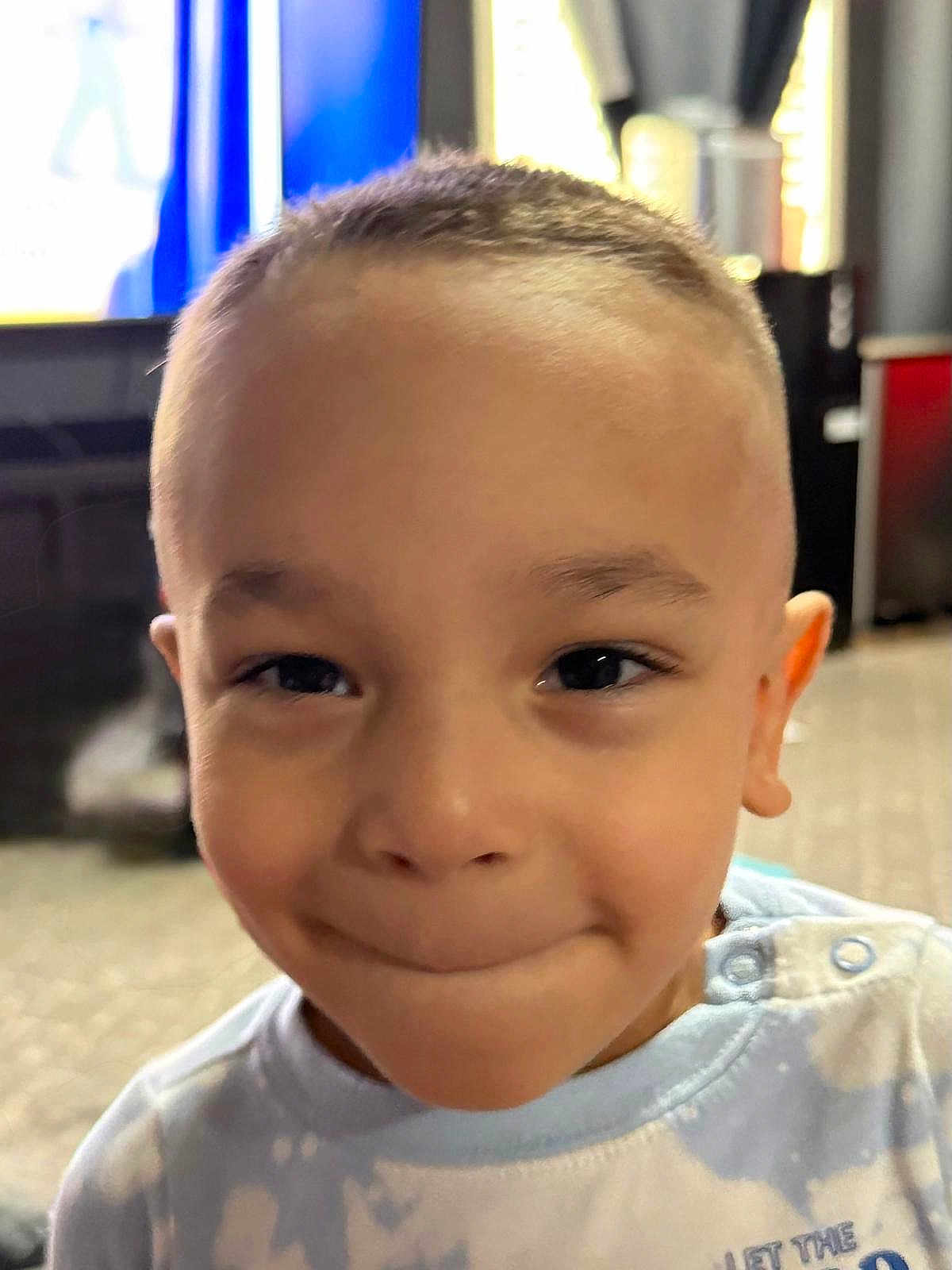 Dominic joined the competition — help win amazing prizes! child, face, portrait, smile, young, boy, closeup, expression, casual_clothing, indoors, buttoned_shirt, short_hair, cute, happy, playful, person, skin, head, eyes, light