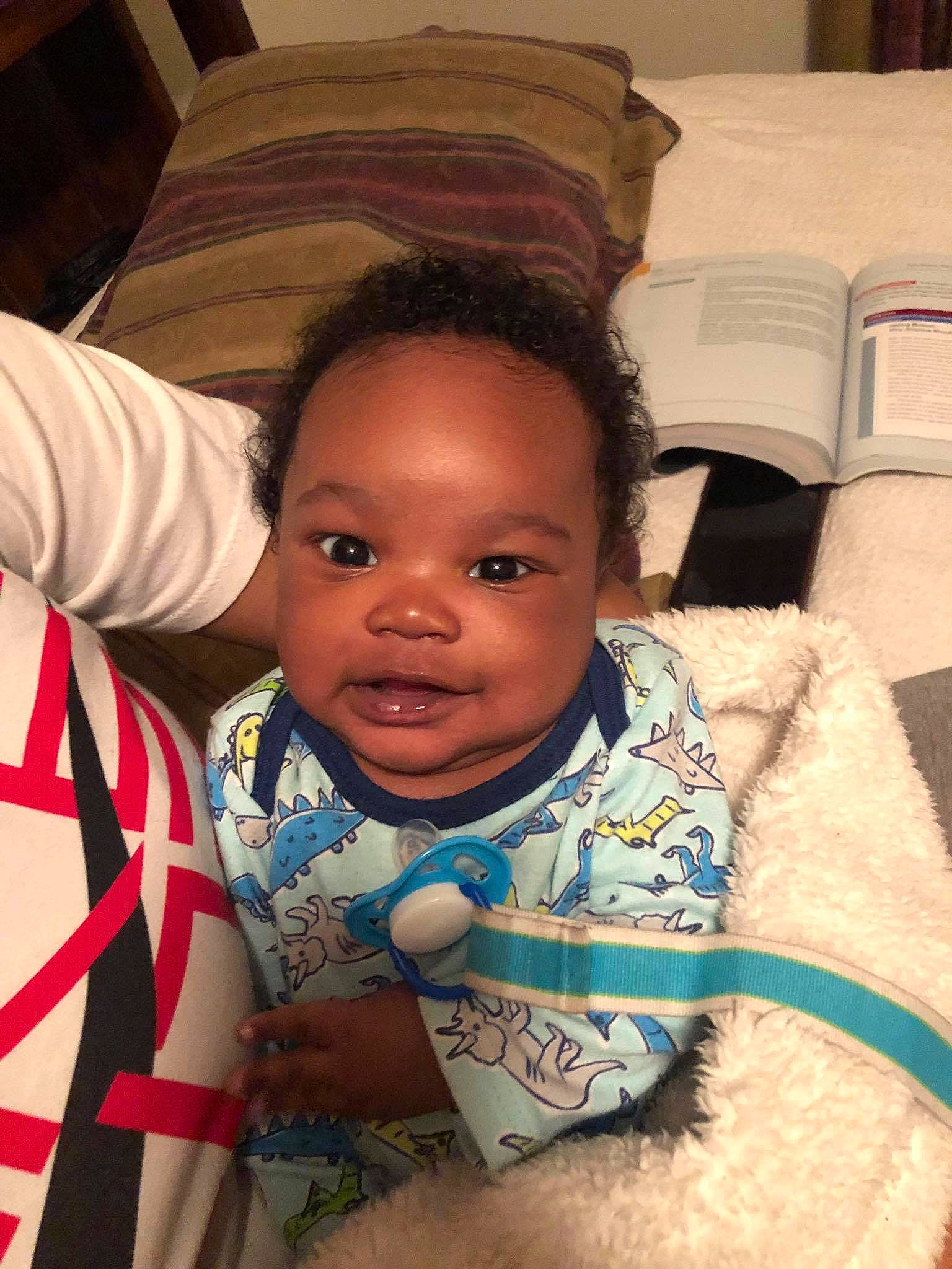 Aiyden is registered to the contest to win money with this photo: baby, cheek, child, face, forehead, head, lip, mouth, person, skin, smile, toddler