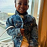 Zayda joined the competition — help win amazing prizes! accessory, bright, casual, child, curtain, cute, denim_jacket, face, fashion, happy, indoor, light, pants, person, portrait, purse, sitting, smile, window, young