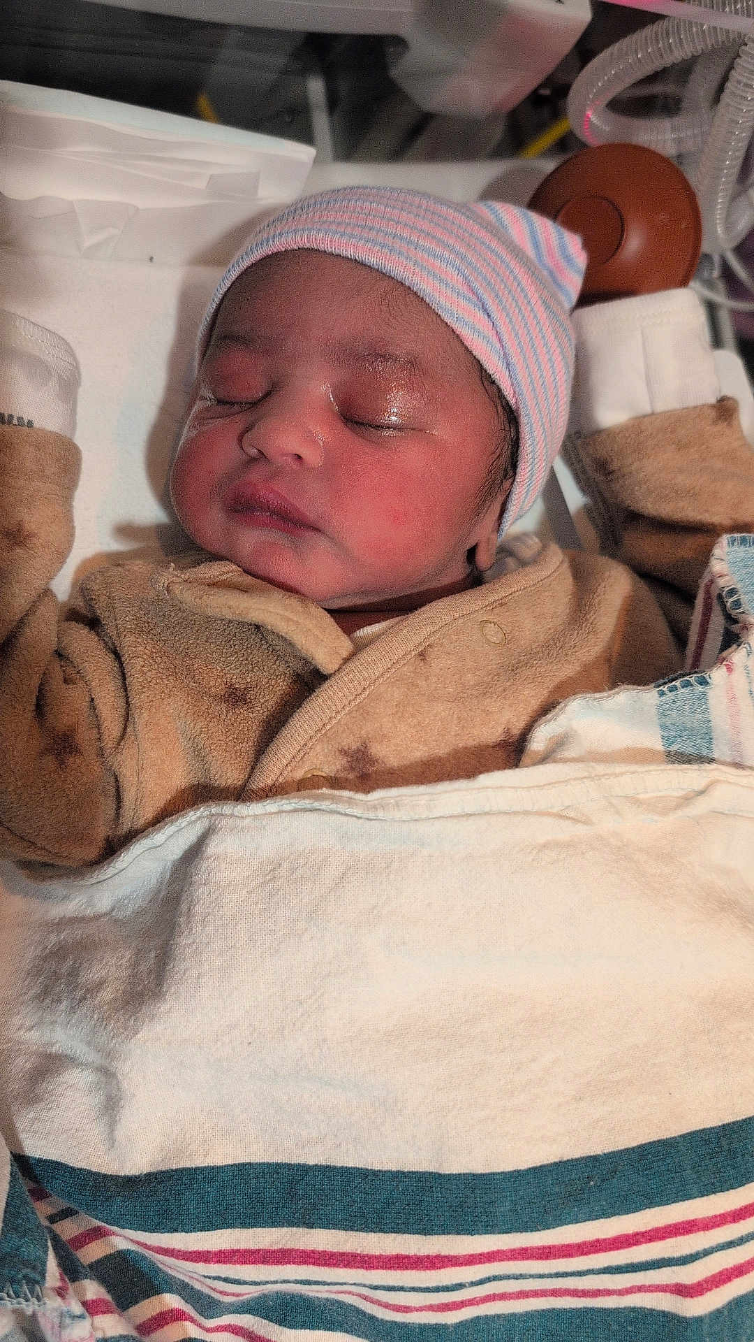 Preston is registered to the contest to win money with this photo: newborn, baby, sleeping, hat, blanket, hospital, incubator, pajamas, infant, child, cozy, cute, face, person, bed, soft, warm, resting, healthcare, closeup