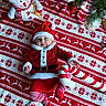 baby, candy_cane, child, christmas, costume, cute, festive_blanket, happy, holiday, holiday_decor, indoor, pine_branches, plush_snowman, portrait, red_and_white, santa_claus_costume, seasonal, smiling, striped_tights, toy