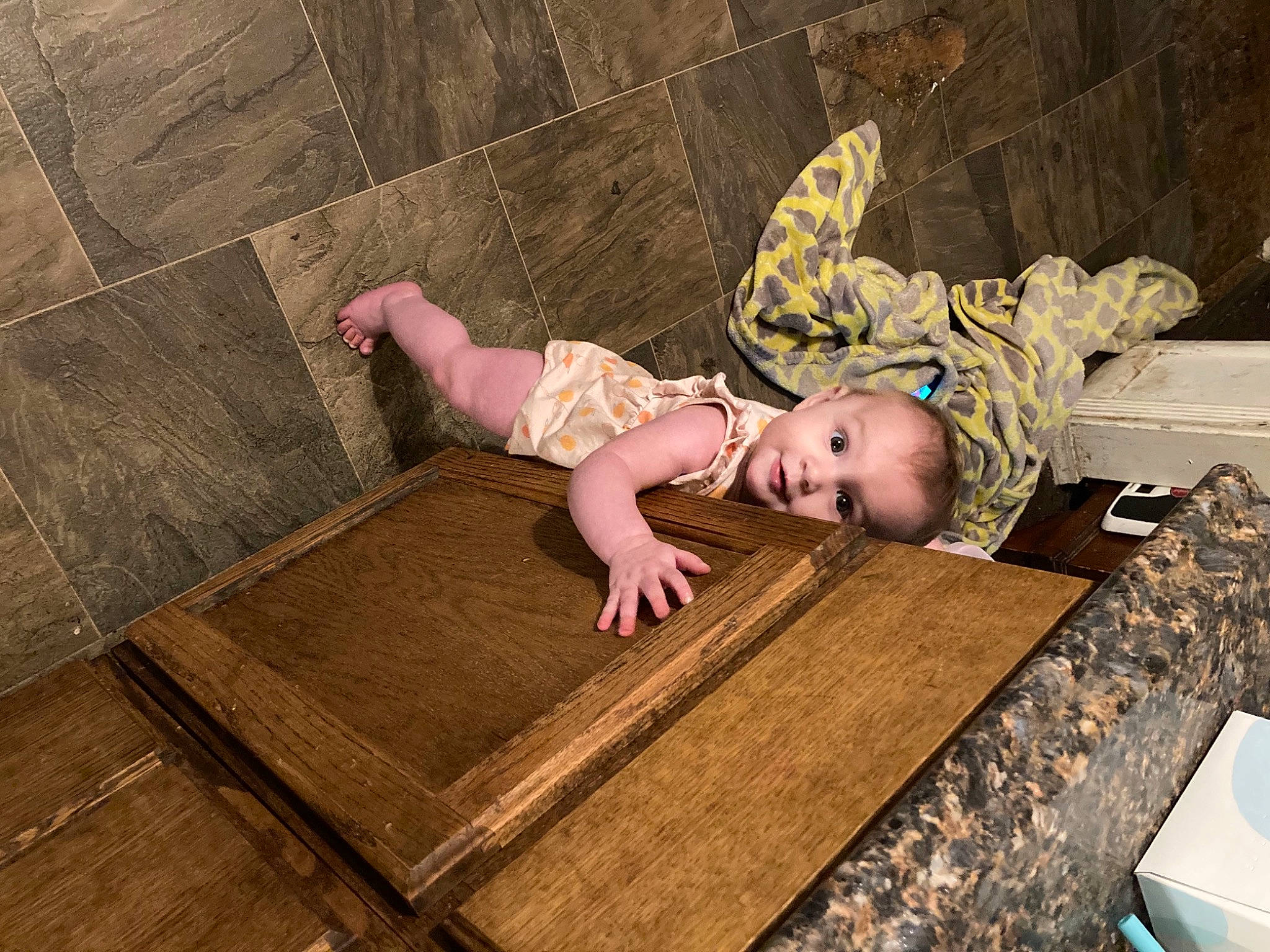 Karma is registered to the contest to win money with this photo: baby, baby_toddler_clothing, child, comfort, dress, flash_photography, floor, flooring, fun, grass, hardwood, laminate_flooring, pattern, person, room, sitting, skin, toddler, wood, wood_flooring