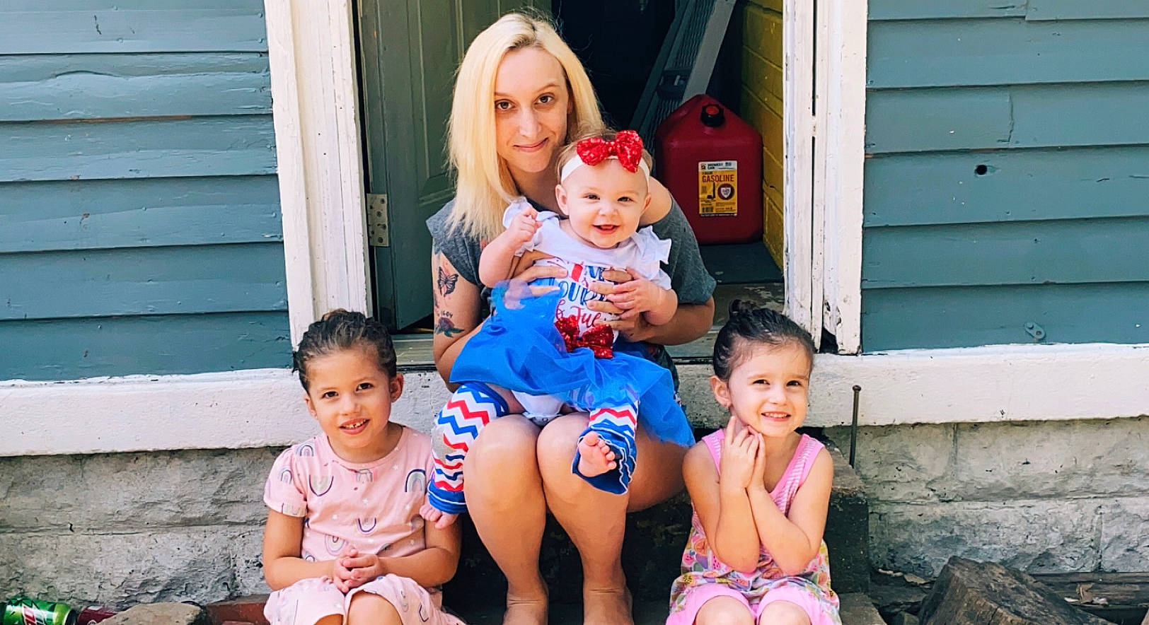 Karma is registered to the contest to win money with this photo: baby_toddler_clothing, blue, clothing, face, fun, happy, head, headwear, joy, leisure, people, people_in_nature, person, photograph, pink, playing_with_kids, red, shorts, skin, smile