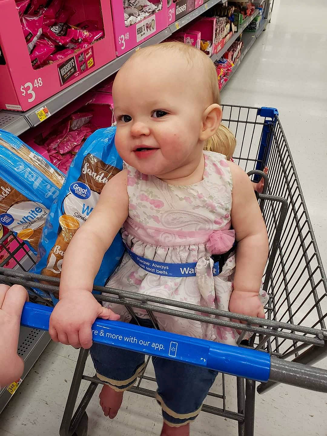 Valentina joined the competition — help win amazing prizes! baby, baby_safety, baby_toddler_clothing, child, electric_blue, fun, happy, human_leg, joy, person, photograph, retail, service, shelf, shopping, shopping_cart, sitting, skin, smile, tire