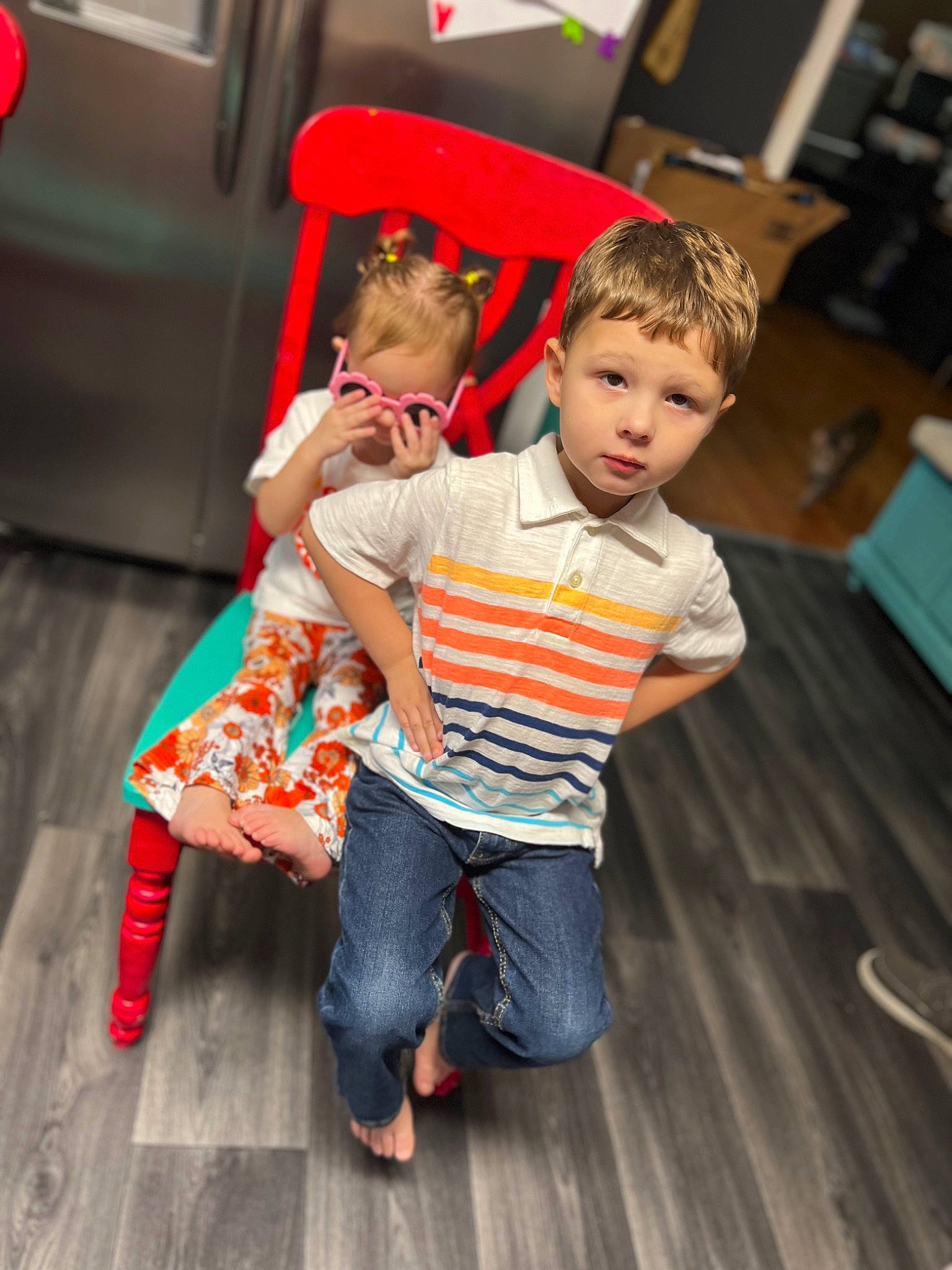 Ryker joined the competition — help win amazing prizes! baby_toddler_clothing, barefoot, child, event, flooring, fun, happy, hardwood, holiday, leisure, person, play, room, sitting, skin, sleeve, t_shirt, toddler, vacation, wood
